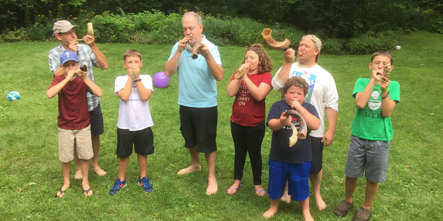 Practicing blowing the shofar